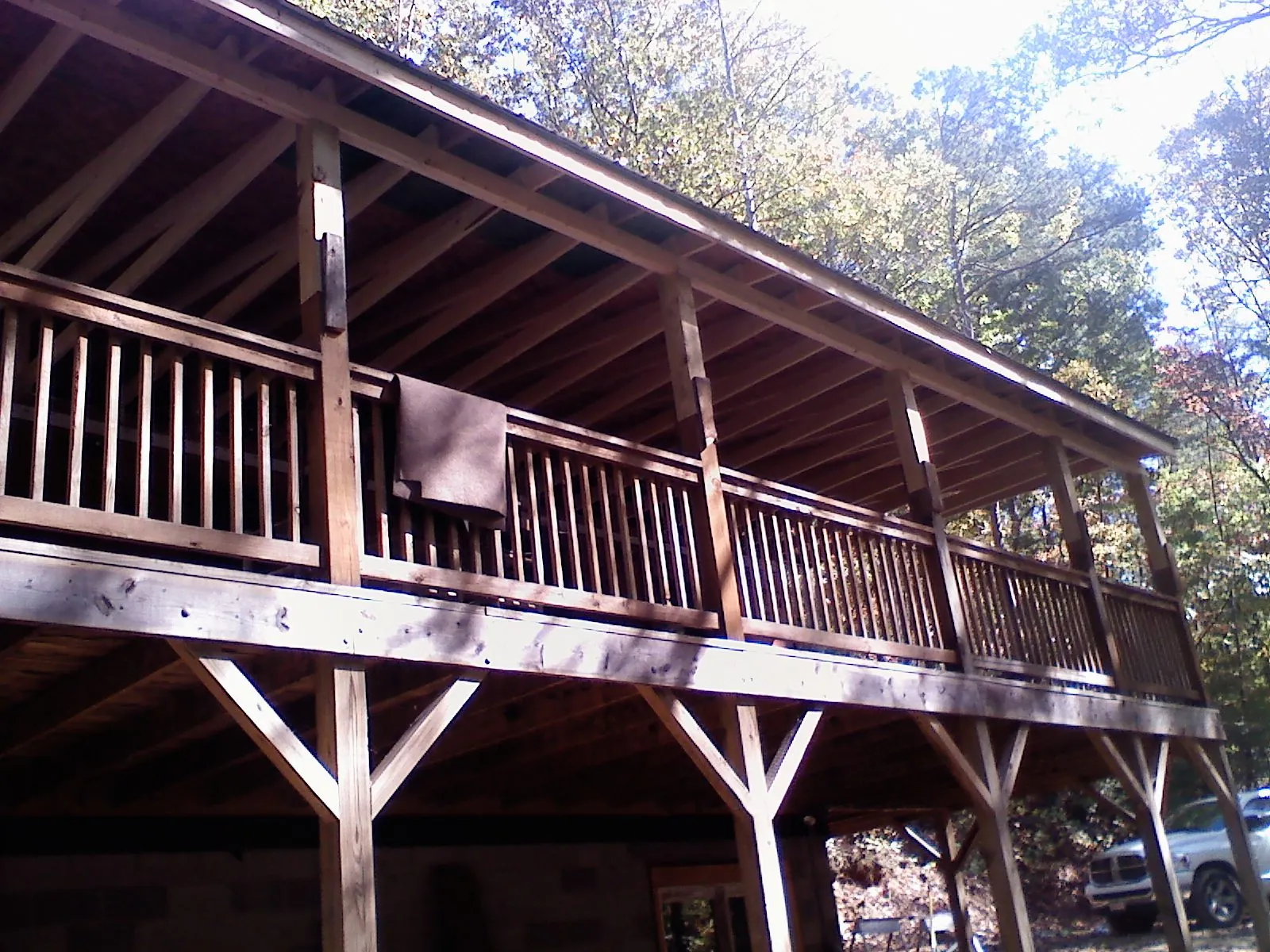 Timber framing under a new elevated porch and deck — Roof Leak Repair in Wampsville by Roofing Brothers
